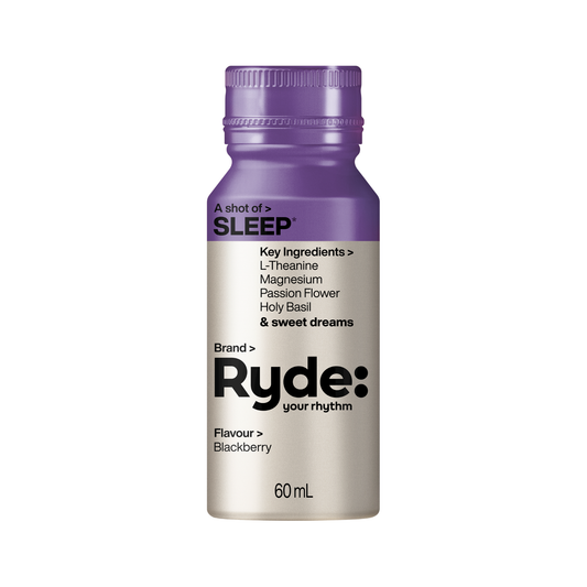Ryde sleep supplement bottle with purple cap and white label on a white background